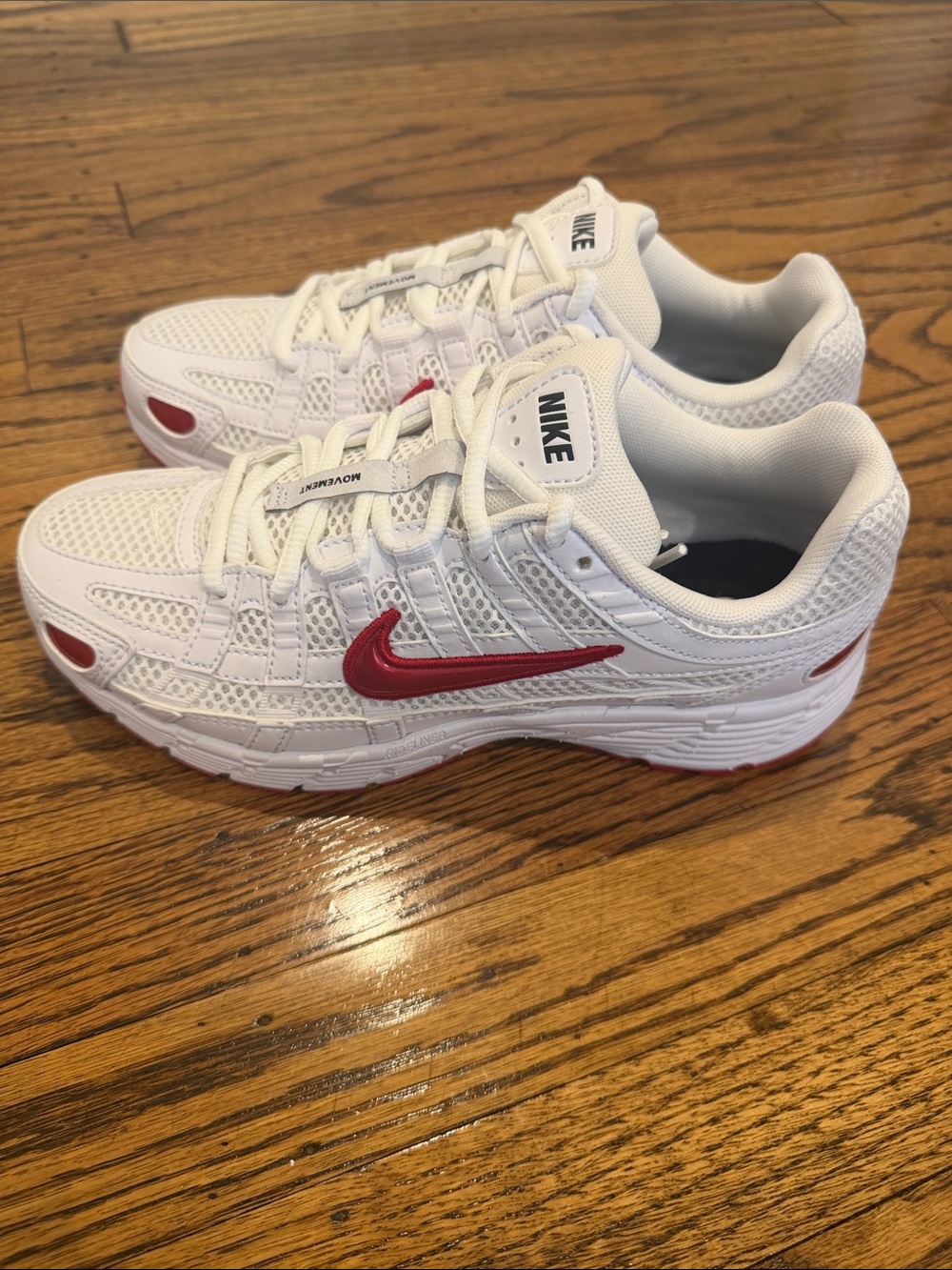 NWOT Nike White Athletic Sneakers with Red Swoosh